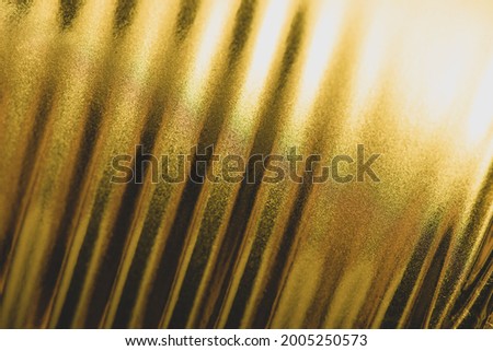 Shiny golden texture background with copy space