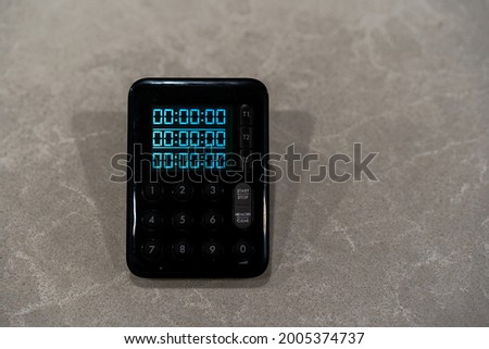 black kitchen timer set to zero productivity tool for time management so food does not burn