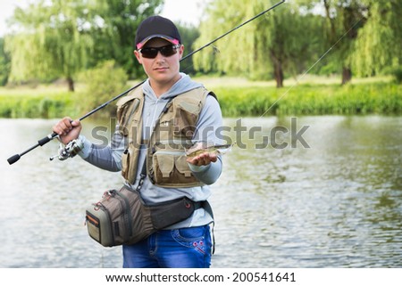 angler catch a pike