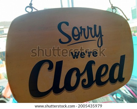 sorry we closed the sign in the cafe photo