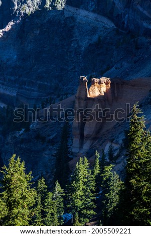 last light on a hoodoo inside of the caldera in Crater Lake National Park with various layers and distinct colors