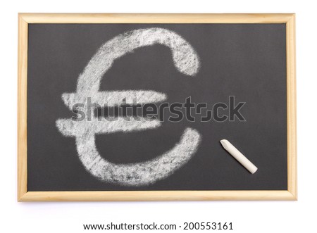 A blackboard with a chalk and the shape of the euro symbol drawn onto. (series)