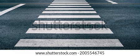 cross walk on the road for safety when people walking cross the street, Pedestrian crossing on repaired asphalt road, Crosswalk on the street for safety, logistic import export and transport industry
