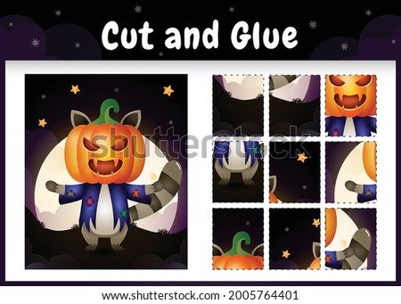 Children board game cut and glue with a cute raccoon using halloween costume