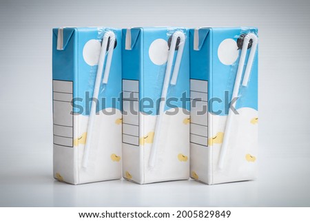 Blue soy milk boxes isolated on a white background  