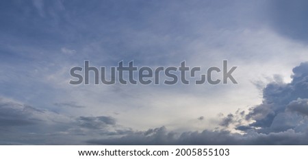 clouds sky landscape nature background. gray cloudy weather. rainclouds covered bright sunlight in spring season. sun light shine in the sky. wet moisture in the air. wide space in atmosphere. Royalty-Free Stock Photo #2005855103