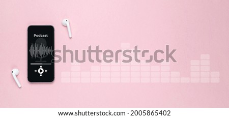 Podcast music. Mobile smartphone screen with podcast application, sound headphones. Audio voice with radio microphone on pink background. Broadcast media music banner with copy space