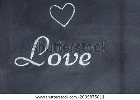 Blackboard with the word love and a drawn heart