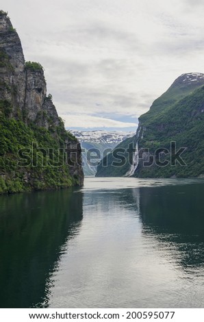 View of a norwegian fjord in Geiranger.Picture taken in a cloudy day