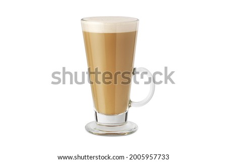 Latte macchiato in beautiful cup on an isolated white background with natural shadow. Cappuccino foamy coffee and milk drink in a transparent glass cup. Chai Latte pouring shot. Chai Latte Drink. Royalty-Free Stock Photo #2005957733