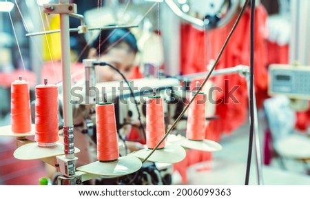 Textile factory in Asia producing textiles for export markets Royalty-Free Stock Photo #2006099363