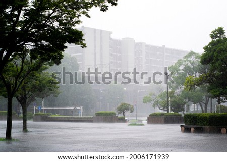 A city with heavy rain Royalty-Free Stock Photo #2006171939