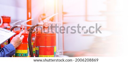Engineer checking Industrial fire control system,Fire Alarm controller, Fire notifier, Anti fire.System ready In the event of a fire. Royalty-Free Stock Photo #2006208869