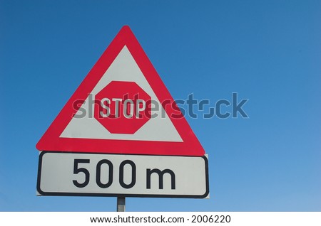 Stop sign on a blue sky background