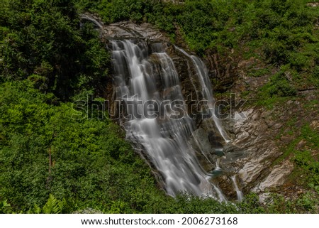 Schleierfall waterfall near Sportgastein place between big color summer mountains