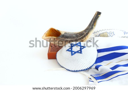 religion image of shofar (horn) on white prayer talit. Rosh hashanah (jewish New Year holiday), Shabbat and Yom kippur concept Royalty-Free Stock Photo #2006297969