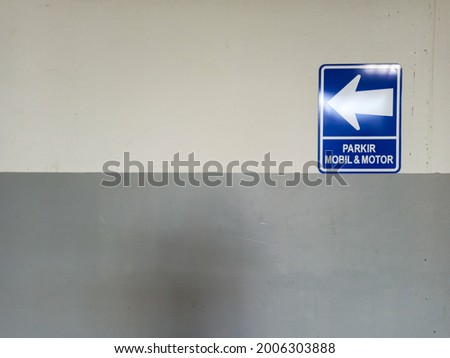 Blue and white directional signage  with space for free text