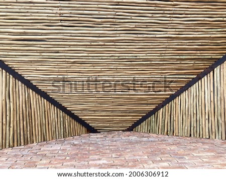 A photo of a wall and decorative wooden slats, ideal as a background image. 