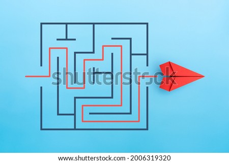 Paper plane with maze, Problem and solution concept Royalty-Free Stock Photo #2006319320