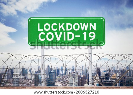 Image of city is lockdown caused by coronavirus behind barbed wire wall