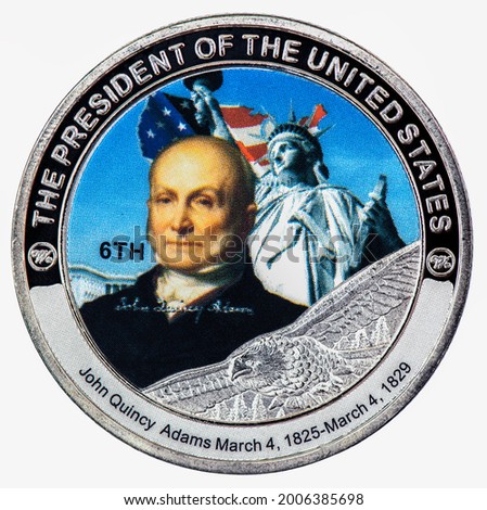 A coin commemorating featuring a portrait The President of The United States. Royalty-Free Stock Photo #2006385698