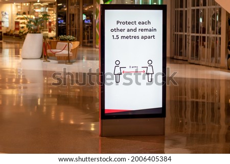 Social distancing information at the shopping centre. Protect each other and remain 1.5 metres apart. Covid-19 outbreak