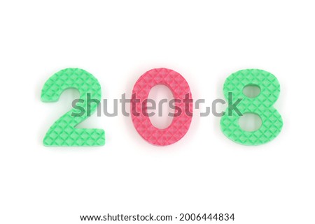 number 208 isolated on white background. Colorful letters on background close up. Alphabet toy. Number two hundred and eight.