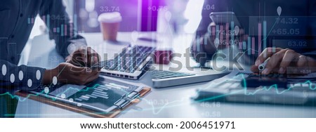 Double exposure of Businessman hands working on tablet computer with network digital finance marketing chart and future technology innovation and digital stock market concept, blurred background.
