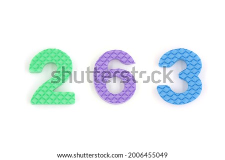 number 263 isolated on white background. Colorful letters on background close up. Alphabet toy. Number two hundred and sixty three.
