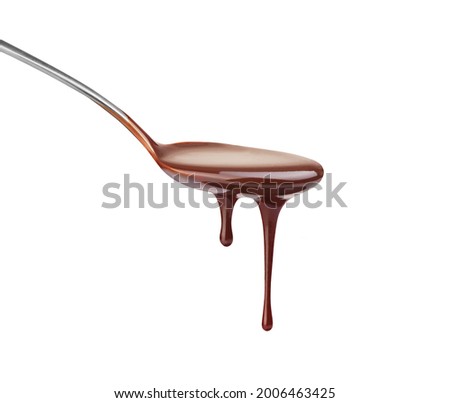 Chocolate in spoon on white background Royalty-Free Stock Photo #2006463425