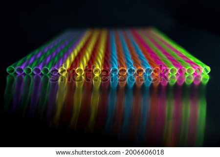 Abstract Geometric Art Concept of Colorful Straws Reflected on Black Surface