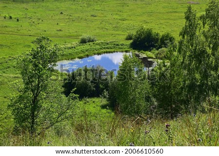 Small nameless lake in the valley of the Sylva river near the slope of Spasskaya mountain