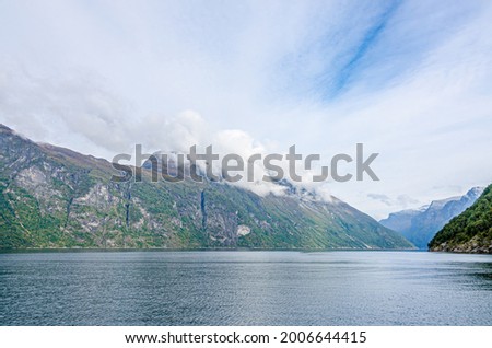 Sunlit Norway landscape at fall time