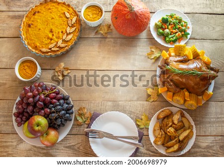 Thanksgiving Day. Chicken close-up. thanksgiving. pumpkins and fruits. View from above. Copy space
