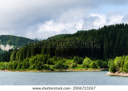 Bolboci Lake or "sea from Bucegi", artificial dam lake in the Bucegi massif, on the Ialomita river. Romania.