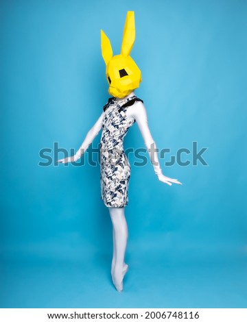 Cute hare on a blue background