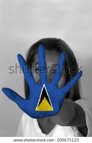 woman with her hands signaling to stop and Saint Lucia flag