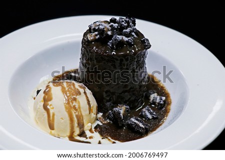 authentic sticky toffee pudding with vanilla ice cream and caramel sauce	