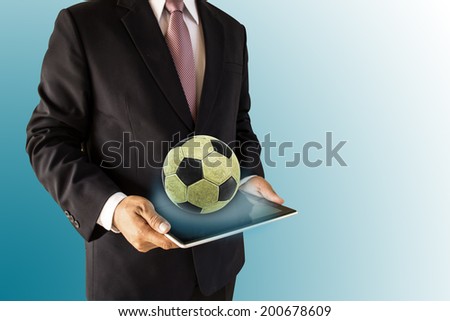 Businessman with a soccer ball