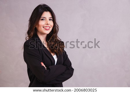 beautiful business woman with arms crossed