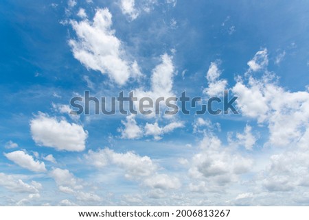 Sunny clear blue sky background with beautiful puffy fluffy clouds and soft white cloudscape in tropical summer or spring morning sunlight and sunshine day, blue sky, Landscape size