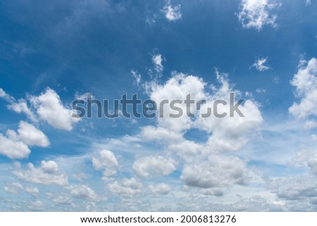 Sunny clear blue sky background with beautiful puffy fluffy clouds and soft white cloudscape in tropical summer or spring morning sunlight and sunshine day, blue sky, Landscape size