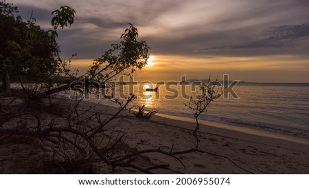 Photo of the sunset at the end of Aceh's white sand beach