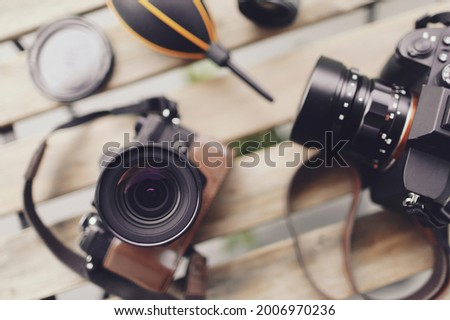 Multiple camera lenses and maintenance Royalty-Free Stock Photo #2006970236