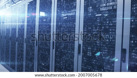 Image of data processing and digital information over network of computer servers with white light trails flashing. global network of internet service provider, data processing centre concept.