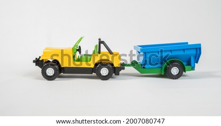 Plastic toy multicolored cars isolated on white background.