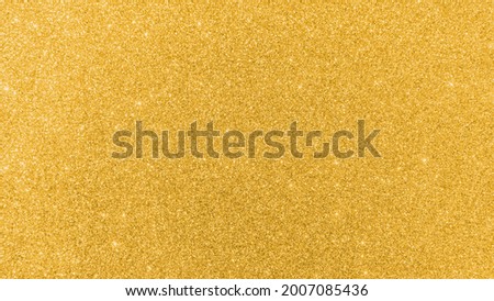 Gold glitter texture background sparkling shiny wrapping paper for Christmas holiday seasonal wallpaper  decoration, greeting and wedding invitation card design element