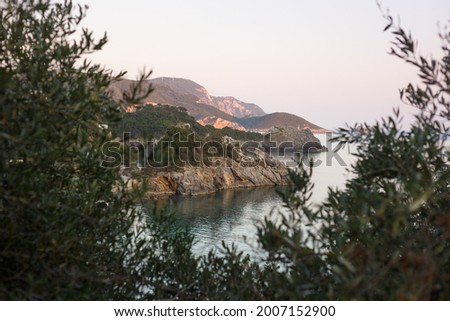 view of the cliffs of the Paleokastritsa bay in the sunset light
