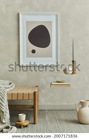 Stylish composition of cozy living room interior with mock up poster frame, plaid on the chaise longue, creative glass coffee table and elegant personal accessories. Neutral wall. Template.
