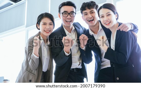 Group portrait of Asian business people
 Royalty-Free Stock Photo #2007179390
